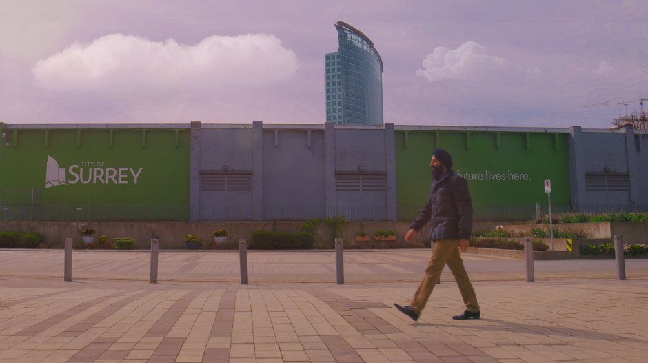 Image of a person walking against cityscape
